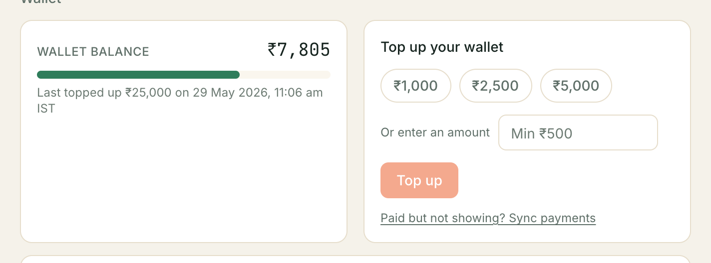 The wallet balance and top-up cards: a balance of ₹7,805 with a usage bar, when it was last topped up, three quick top-up amounts, a minimum-₹500 custom amount box, and a Top up button.